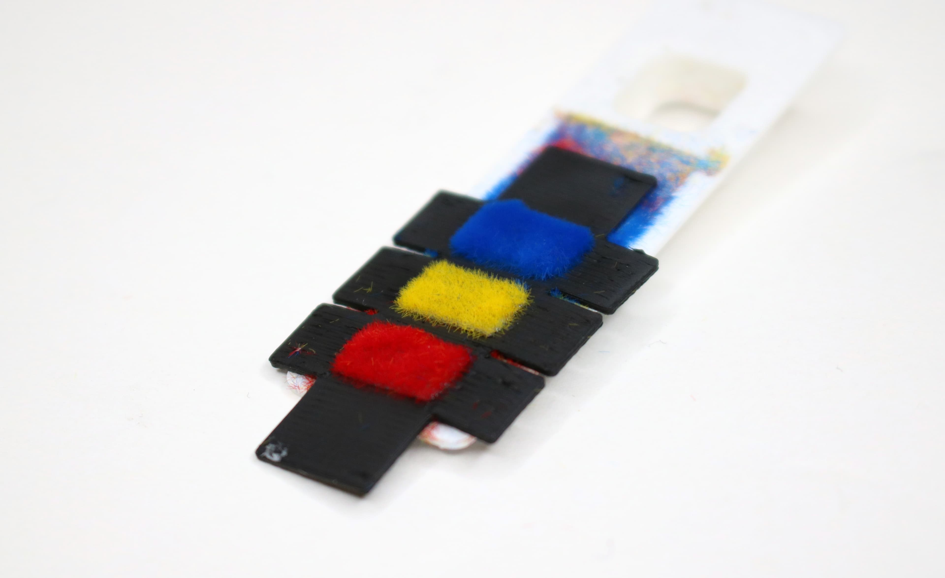 Joule-flocked smart textile prototype detail.